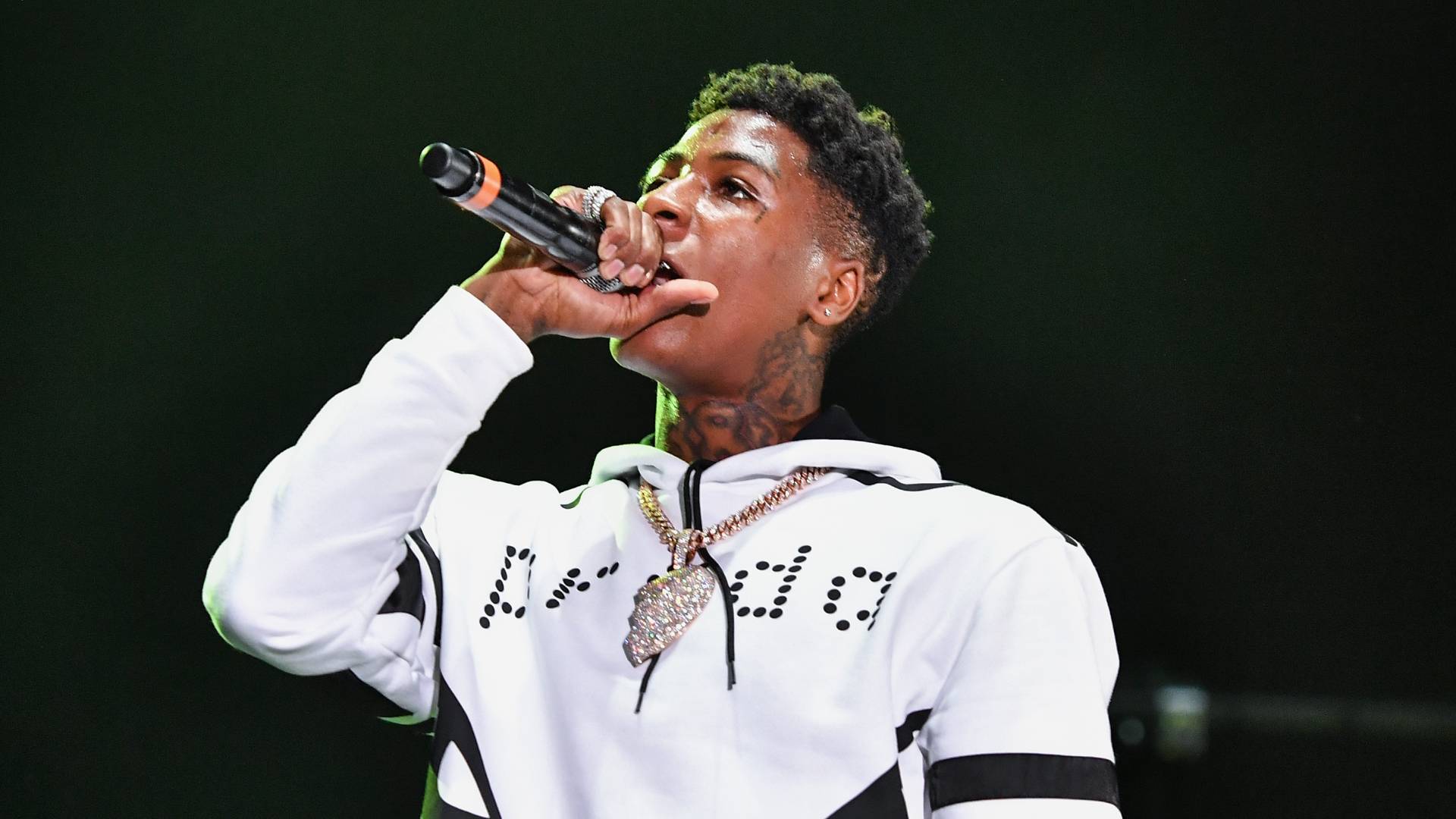NBA YoungBoy performs during Lil WeezyAna at Champions Square on August 25, 2018 in New Orleans, Louisiana. 