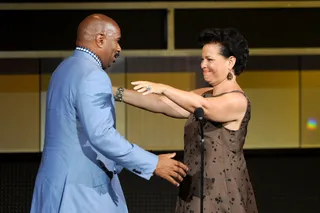 Honoring the Honoree - Steve Harvey gets a warm hug from BET Networks Chairman and CEO Debra Lee just before accepting his Humanitarian Award at the 2011 BET Awards.