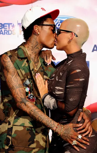 Get a Room! - The award for the most amorous couple of the evening goes to Wiz Khalifa and Amber Rose. From the groping on the red carpet to the constant making out during the show, the couple wanted the world to know they are madly in love.&nbsp;(Photo by Jason Merritt/Getty Images)