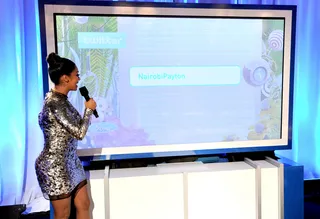 And The Winner Is ... - LaLa Anthony prepares to announce the winner of the 2012 Ford Focus from the Ford Focus Social Media Lounge.(Photo by Earl Gibson/PictureGroup)