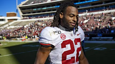 FAYETTEVILLE, AR - NOVEMBER 9:  Najee Harris #22 of the Alabama Crimson Tide walks off the field after a game against the Mississippi State Bulldogs at Davis Wade Stadium on November 16, 2019 in Starkville, Mississippi.  The Crimson Tide defeated the Bulldogs 38-7.  (Photo by Wesley Hitt/Getty Images)