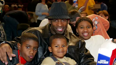 Deion Sanders - NFL legend Deion Sanders celebrates family day with his children at Madison Square Garden in 2003.&nbsp;(Photo: Ray Amati/Getty Images)