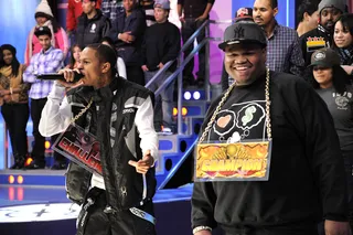 Bring It On - Freestyle Friday champion Relly cracks a smile as Baker delivers his strongest punchlines at 106 &amp; Park, January 06, 2012.(Photo: John Ricard/BET)