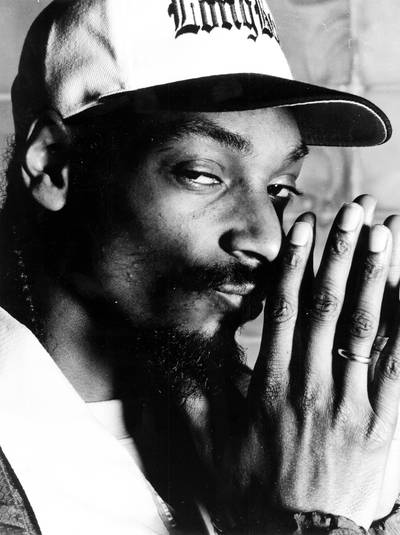 What's In A Name? - Snoop Dogg was born Calvin Cordozar Broadus, Jr. on October 19, 1971. During his childhood he was nicknamed &quot;Snoopy&quot; because he resembled the Peanuts character. Lucky for him the name stuck and helped make him a star.(Photo: Al Pereira/Michael Ochs Archives/Getty Images)