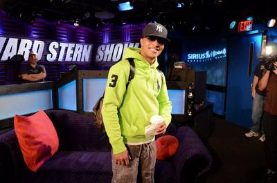 T.I. - What you know about that? In an interview with Howard Stern, T.I. revealed that he got in a fight in prison — complete with prisoners and guards placing bets.&nbsp; (Photo: Courtesy howardstern.com)