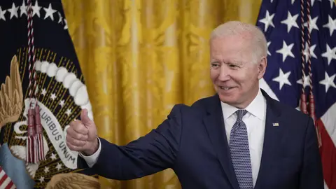 WASHINGTON, DC - JUNE 17: U.S. President Joe Biden gives the thumbs up to the audience before signing the Juneteenth National Independence Day Act into law in the East Room of the White House on June 17, 2021 in Washington, DC. The Juneteenth holiday marks the end of slavery in the United States and the Juneteenth National Independence Day will become the 12th legal federal holiday â the first new one since Martin Luther King Jr. Day was signed into law in 1983. (Photo by Drew Angerer/Getty Images)