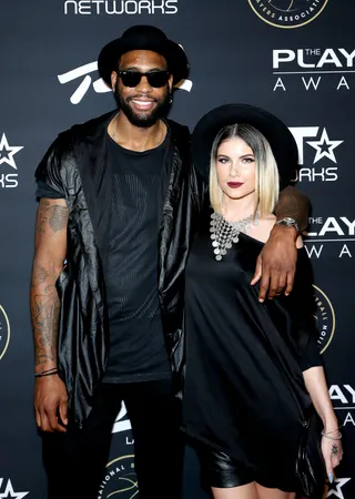 Black Is Beautiful  - These two really know how to make an entrance as they pose for a quick flick on The Players' Awards red carpet. (Photo: Gabe Ginsberg/BET/Getty Images)