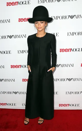 All-Black Everything - Yes, Pharrell made oversized hats cool. Now, this fashionista makes them chic. She pairs her Emporio Armani topper with the brand’s long sleeved jumpsuit and simple sandals at Armani’s Young Hollywood bash.  (Photo: Frederick M. Brown/Getty Images)