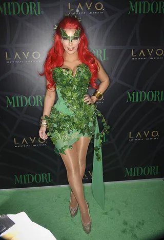 Kim Kardashian&nbsp;as Poison Ivy - We're loving this villainous number that Kim Kardashian donned in 2011. Poison Ivy never looked so good! Why not head to a home goods store for some fake foliage to make your own version at home?  (Photo: Dave Kotinsky/Getty Images)