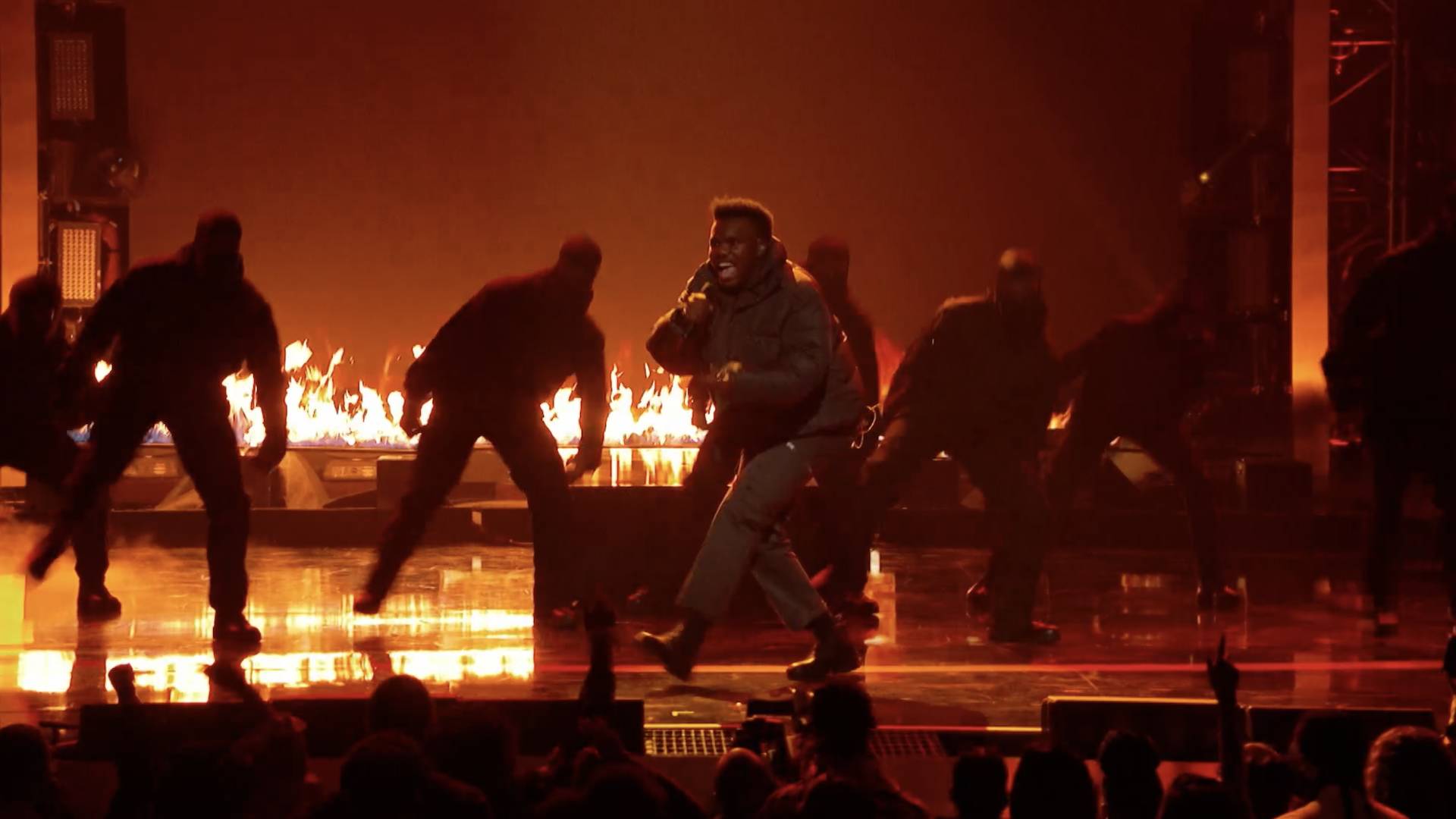 Baby Keem performing on stage full of fire at the BET Hip Hop Awards 2021.