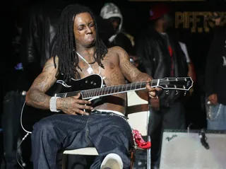 Rockstar Repertoire - The full blooming of Weezy's rockstar repertoire will have to wait another eight months before it completely blossoms.