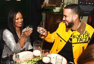 Cheers! - French Montana and Garcelle Beauvais enjoy dinner with drinks.(Photo: Vince Flores/startraksphoto.com)