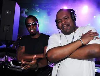 Bright Lights, Hot Nights - Diddy and Biz Markie pose in the DJ booth during the &quot;Black and White Attire Memorial Day Weekend Party&quot; at Chateau Nightclub and Gardens in Las Vegas.   (Photo: Denise Truscello/WireImage)