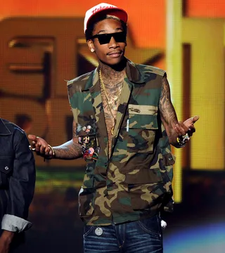 Wiz Khalifa - Both of Wiz's parents served in the U.S. army and he grew up in Germany, England, and Japan before moving to Pittsburgh, Pennsylvania after his parents' divorce.(Photo: Kevin Winter/Getty Images)