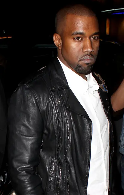 Well he is The Louis Vuitton Don! Stylish Kanye West makes a standout  appearance at Men's Fashion Week in fur lined jacket