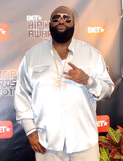 Rick Ross - There's two things we know about silk, besides it being a smooth and cool, loose fitting fabric, it's Rick Ross' attire of choice. Here the Maybach boss hits the 2011 BET Hip Hop Awards red carpet adorned in custom silk shirt similar to the one he wore in the &quot;Aston Martin Music&quot; video from his Deeper Than Rap album.(Photo: Chris McKay/Getty Images)