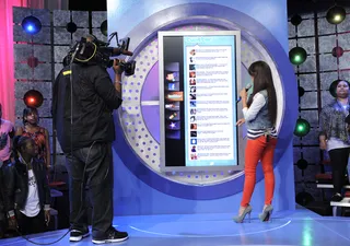 Whoa - Rocsi Diaz reads tweets from the Twitter board, todays trending topic is #ThingsThatAnnoyMe at 106 &amp; Park, May 24, 2012. (Photo: John Ricard / BET)