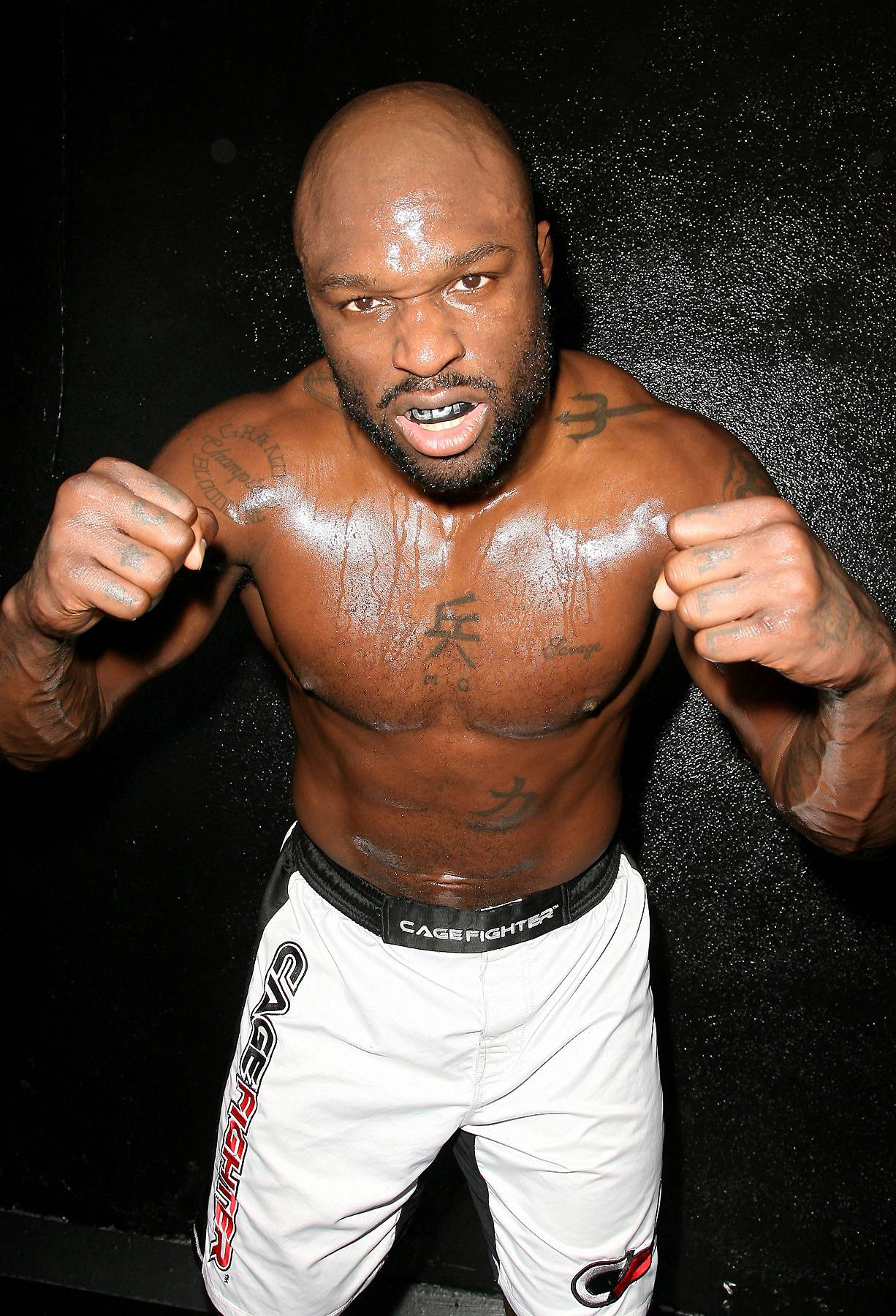 King of the Ring - Mixed martial arts fighter Muhammed Lawal, also known as King Mo, recently signed a landmark joint deal to appear at both MMA’s Bellator Fighting Championships and TNA’s IMPACT Wrestling. To prep for his crossover into pro wrestling, Lawal reportedly reached out to legends Hulk Hogan and Sting for advice, who told the fighter to relax and &quot;just to learn and have fun.” Lawal makes his TNA debut this summer.&nbsp;  (Photo: Valerie Macon/Getty Images)