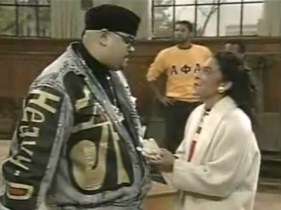 Small-Screen Big Man\r - It was never just music with Heavy D. He was one of the first rappers to make a successful transition to acting, parlaying a classic appearance on the hit sitcom A Different World (above) into roles as a recurring character on both Living Single and Roc.\r\r(Photo: NBC)