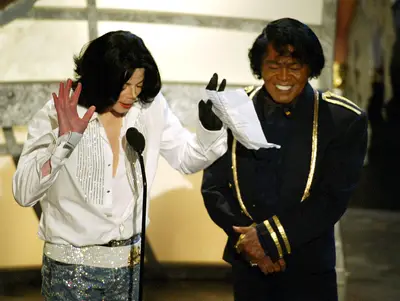 Michael Jackson Surprises James Brown (2003) - It doesn’t get more epic than “The King of Pop” surprising “The Godfather of Soul” on stage at the 2003 BET Awards. Michael broke down when he presented the Lifetime Achievement Award to James Brown, calling him his biggest influence.(Photo:&nbsp; Kevin Winter/Getty Images)