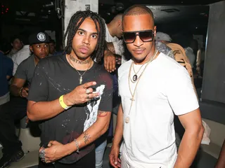 Vic Mensa and T.I. - The two rappers pose for the camera at Mensa's listening party hosted by Up&amp;Down. &nbsp;(Photo: David X Prutting/BFA.com)