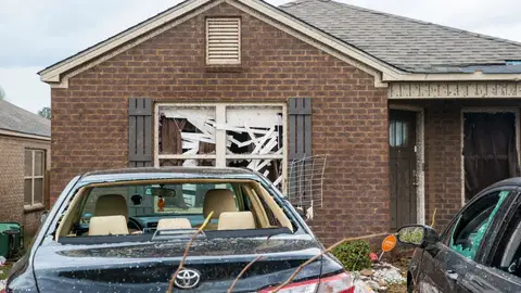 Homes and cars on Waterbury Drive were heavily damaged as tornado activity hit numerous sites, Wednesday, March 17, 2021, in Moundville, Ala. (AP Photo/Vasha Hunt)