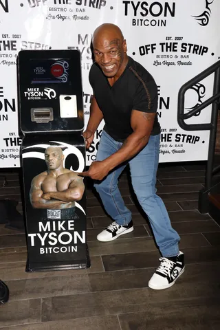 Like Mike - Mike Tyson is the face of untrackable currency. The former champ attends the launch of the world's first Mike Tyson Bitcoin ATM machine in Las Vegas.&nbsp;  (Photo: CPA, PacificCoastNews)