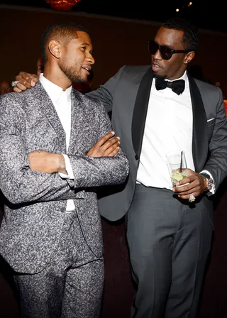 Fly Guys - Usher and Sean &quot;Diddy&quot; Combs are suited and booted as they chat inside the 55th Annual GRAMMY Awards Pre-GRAMMY Gala and Salute to Industry Icons honoring L.A. Reid held at the Beverly Hilton in Los Angeles.(Photo: Larry Busacca/Getty Images for NARAS)