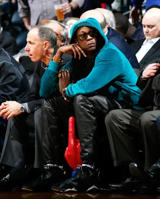 Courtside View - Rapper 2 Chainz looks bored as he watches the Atlanta Hawks take on the Memphis Grizzlies at Philips Arena in Atlanta. (Photo: Kevin C. Cox/Getty Images)
