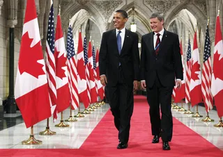 Canada Bound - President Obama met with Canadian Prime Minister Stephen Harper for a news conference on Parliament Hill in Ottawa in February 2009.&nbsp; (Photo: REUTERS/Chris Wattie)