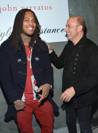 Old School, New School - Rapper Waka Flocka and fashion designer John Varvatos pose for a picture at the launch of the new JohnVarvatos.com website at the NYC flagship store.&nbsp;(Photo: Mike Coppola/Getty Images for John Varvatos)