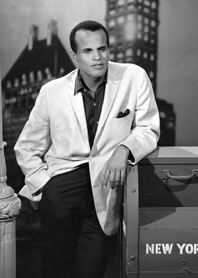 Harry Belafonte - Harry Belafonte’s smart fashion choices are a reflection of his Caribbean roots. Whether cleaned up or dressed down, the cute-faced Calypso singer and civil rights activist always leaves a few buttons undone.  (Photo: CBS /Landov)