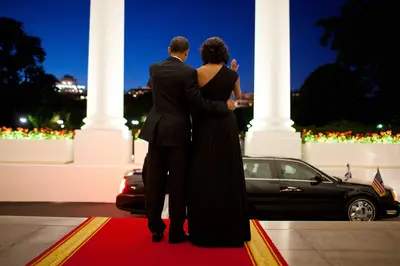 Love at Dusk - President Obama and the first lady wave goodbye to President Shimon Peres of Israel following a dinner in his honor at the White House.&nbsp;(Photo: Pete Souza/Official White House)