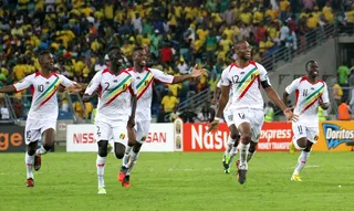 Mali Marches On - Mali players celebrate victory following a favorable penalty shootout in the quarterfinal against South Africa. They face powerhouse team Nigeria on Feb. 6. (Photo:&nbsp; Anesh Debiky/Gallo Images/Getty Images)