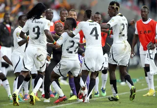 Ghana Gets Down - Wakaso Mubarak of Ghana celebrates scoring during the quarterfinal match against Cape Verde. Ghana will now take on Burkina Faso on Feb. 6. (Photo:&nbsp; Ian Walton/Getty Images)