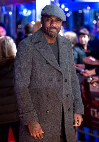 The Dapper Gent - Idris Elba&nbsp;is as handsome as ever with a scruffy 5 o'clock shadow and pageboy cap at the world premiere of The Gunman at BFI Southbank in London.(Photo: Ian Gavan/Getty Images)