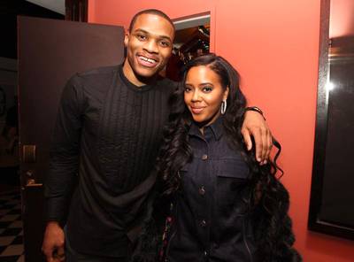 Fashionisto - Russell Westbrook poses with Angela Simmons at the celebration of his second iteration of the exclusive Westbrook XO Barneys New York collection. The luxury retailer, along with Hennessy V.S, honored the Oklahoma City Thunder point guard’s contributions to style both on and off the court during the 2015 All-Star Weekend, where Westbrook also took home the MVP trophy at the big game.(Photo: Soul Brother (Westbrook) via PMG Media Group)