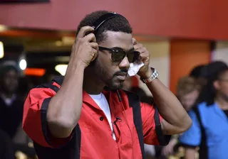 Gentleman in Red - Apparently music between his turns helped Ray J focus. (Photo: Kris Connor/BET/Getty Images for BET)