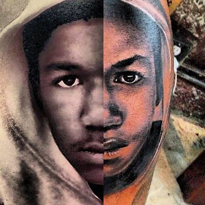 Trayvon Martin - Game recently unveiled his new tattoo commemorating the memory of Trayvon Martin, the unarmed Florida teenager shot dead by George Zimmerman last February. A father himself, the rapper had been a vocal supporter for the Martin family during Zimmerman's trial.   (Photo: The Game via Instagram)