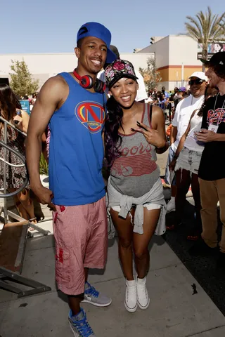 Doing Good in the Hood - Nick Cannon and Meagan Good smile for a photo at Nick Cannon's 3rd annual Back to School Giveaway at Baldwin Hills Crenshaw Plaza in Los Angeles.&nbsp;(Photo: Mike Windle/Getty Images)