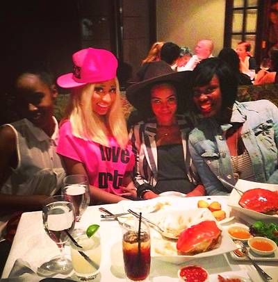 Nicki Minaj   - The MC enjoys this seafood spread with friends.  (Photo: Nicki Minaj via Instagram)