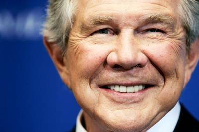 Pat Robertson - &quot;[Obama] wouldn't admit to being a socialist but that's what it is,&quot; said evangelist Pat Robertson on the Christian Broadcasting Network's 700 Club on Dec. 13. &quot;He has an agenda.&quot;&nbsp; (Photo: Win McNamee/Getty Images)