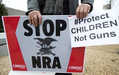 The NRA Responds - The National Rifle Association, which boasts 4.3 million members, has long rallied for lighter gun restrictions. After remaining mum on the issue in the first days following the Sandy Hook tragedy, the NRA said in its first official statement on Dec. 18 that the group &quot;was prepared to offer meaningful contributions to help make sure this never happens again.&quot; (Photo: AP Photo/Manuel Balce Ceneta)