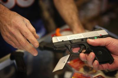 What Are the Federal Guidelines for Purchasing a Firearm? - The Gun Control Act (GCA) states that you must be 18 or older to purchase long guns and ammunition from an authorized dealer. You must be 21 years old or older to purchase a handgun and ammunition for handguns from an authorized dealer. You must also must pass a background check and meet certain legal requirements. (Photo: Scott Olson/Getty Images)