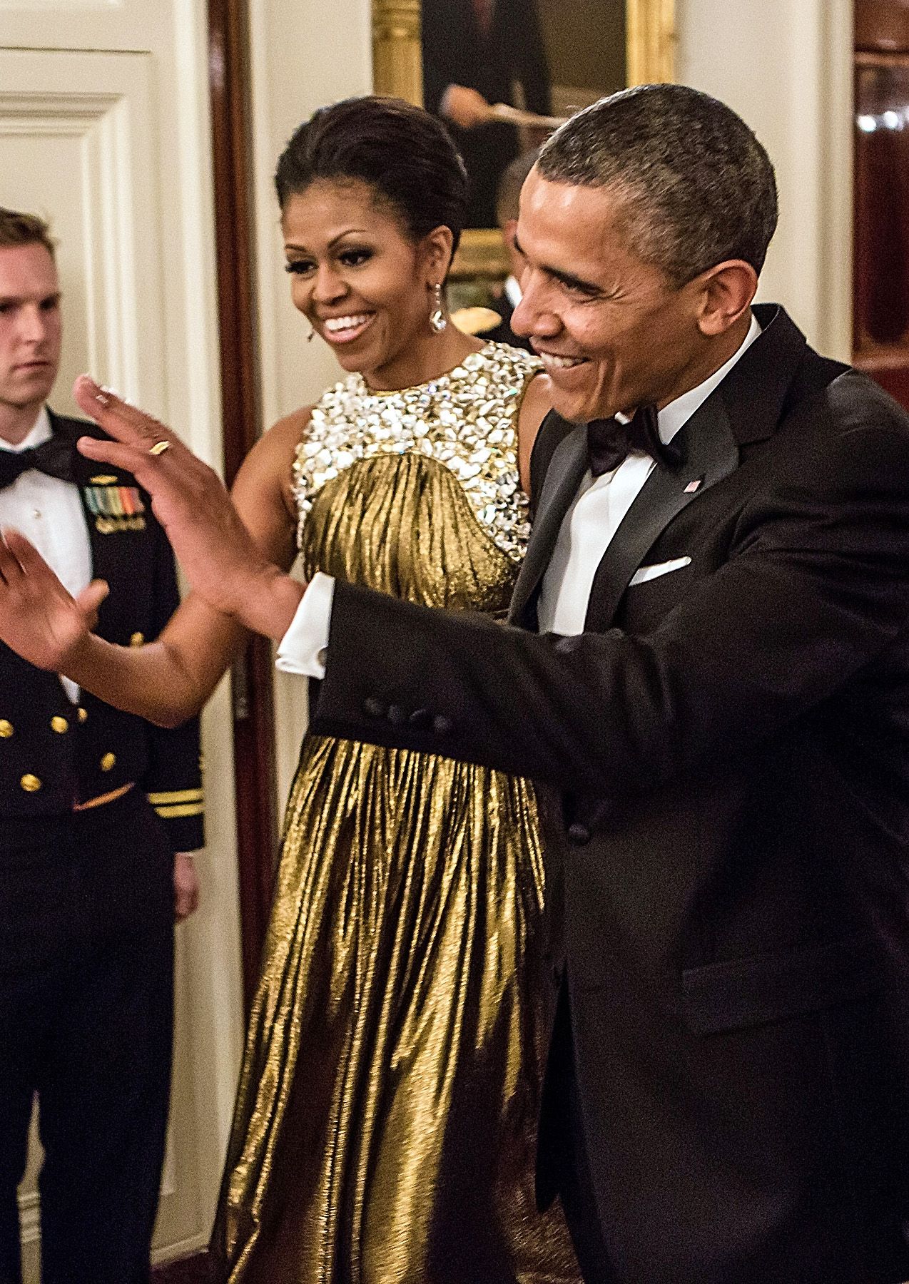 Gold-Studded - President Barack Obama and First Lady Michelle Obama arrive at the Kennedy Center Honors reception at the White House on December 2, 2012, in Washington, D.C.&nbsp; (Photo: Brendan Hoffman/Getty Images)