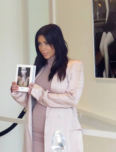 Bookish - Kim Kardashian makes an appearance at the DASH boutique in West Hollywood to promote her book Selfish. Earlier in the day, Kardashian bragged on Instagram that the book is in its fourth printing.  (Photo: MONEY$HOT / Splash News)