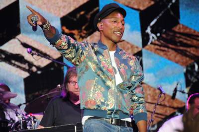 Bathroom's to the Right - Pharrell helps out with directions while on stage at the 2015 FOLD Festival at Martha Clara Vineyards in Riverhead, New York. (Photo: John Roca, PacificCoastNews)