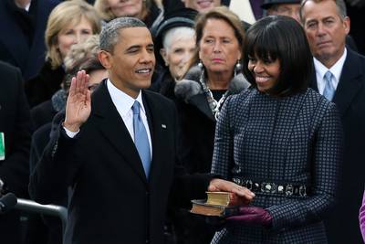 /content/dam/betcom/images/2013/01/National-01-16-01-31/012113-national-inauguration-2013-obama-michelle-sworn-in-bible-oath.jpg