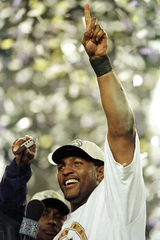 Super Bowl Champion - Lewis helped lead the Ravens to a stunning 34-7 win over the New York Giants in Super Bowl XXXV and was named the night’s MVP. (Photo: Andy Lyons /Allsport)