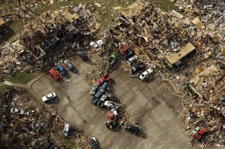 Homes Destroyed - A destroyed apartment complex in Joplin.(Photo: AP Photo/Charlie Riedel)